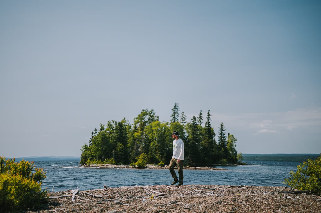 NCC program director for Newfoundland and Labrador Piers Evans walks on the shore of Beothuk Lake, NL, at NCC's Beothuk Lake Nature Reserve.