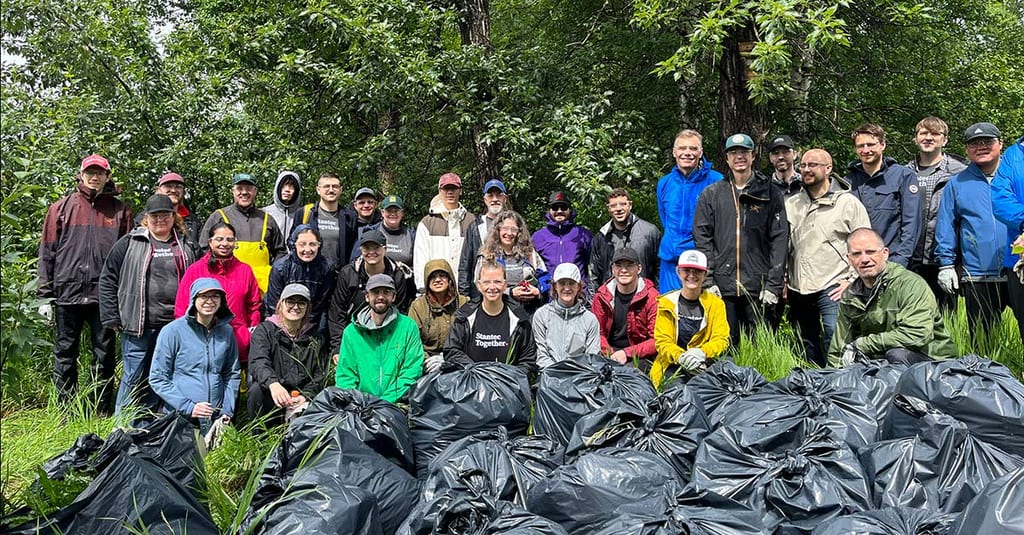 Volunteers with more than 30 bags of weeds post-event (Photo Ocean Kveder/NCC)